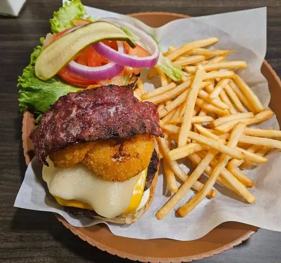 Slow-roasted chicken dinner with sides at Chicken Hub Lethbridge